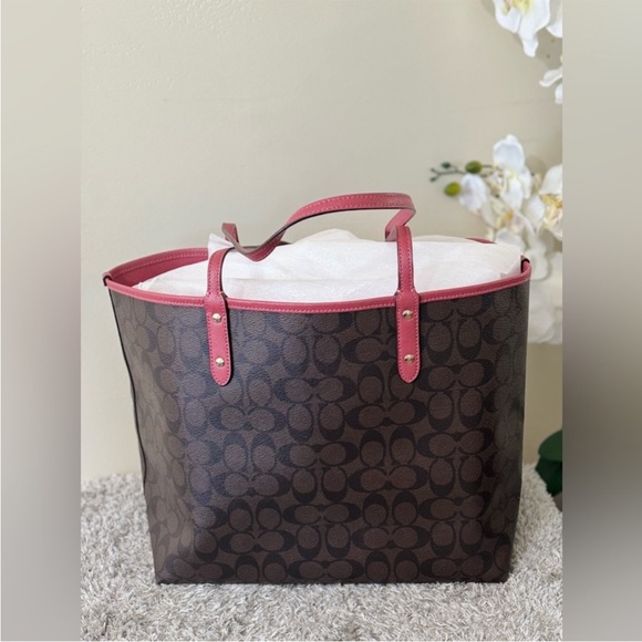 COACH Reversible Brown/Old Rose Signature Coated Canvas Leather City Tote - Picture 4 of 15